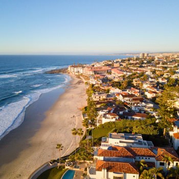 Aerial view of the La Jolla coastline and homes