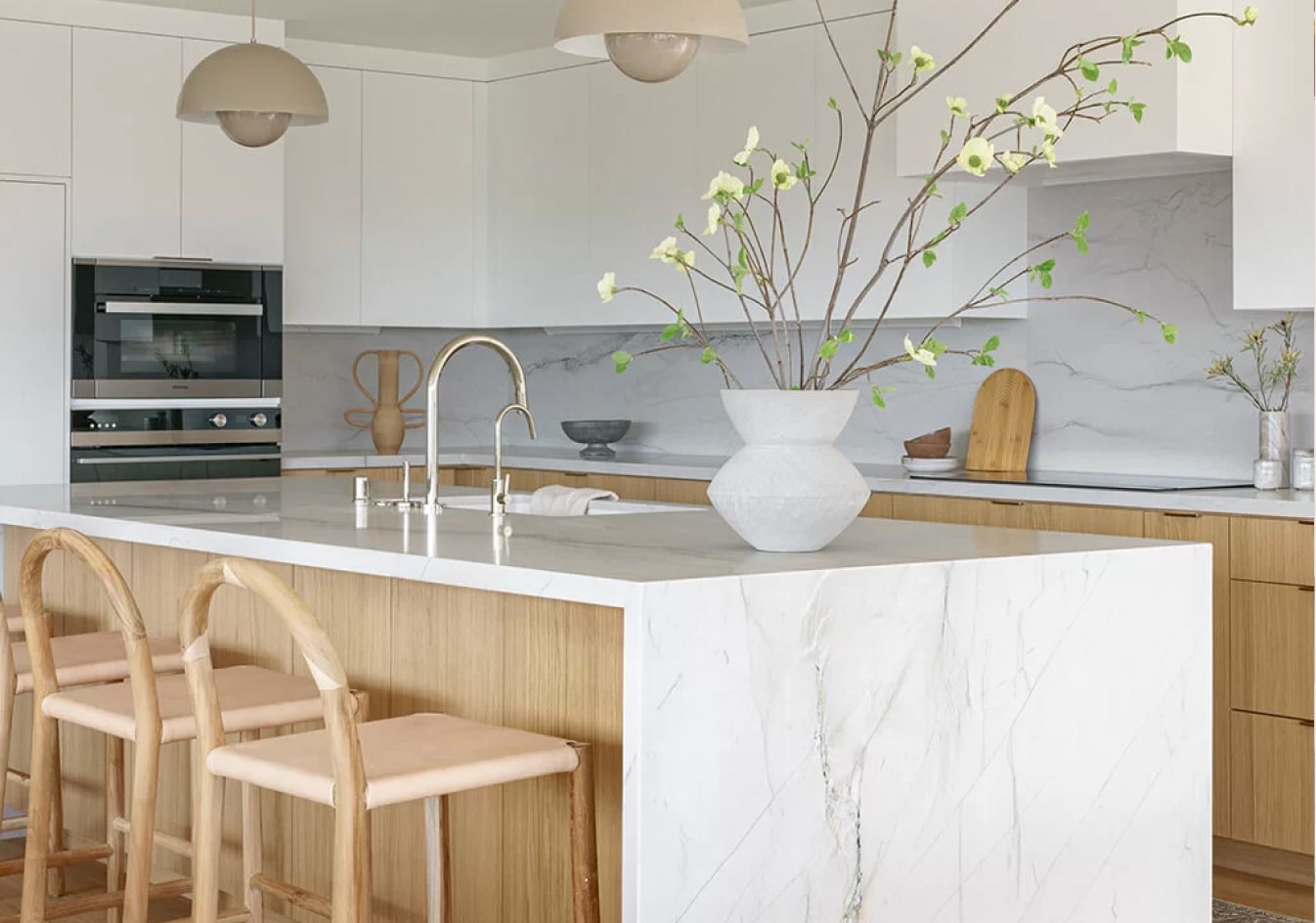 Lars kitchen combining coordinated cabinetry, countertops, appliances, fixtures, and lighting