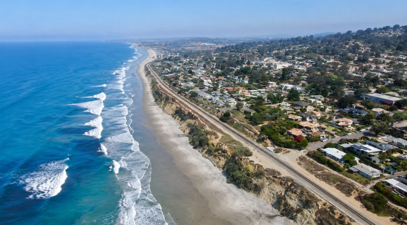 Integrated architecture, interior design, permitting, and construction for Del Mar coastal homes, bluff-edge properties, older beach cottages, and tight village lots.