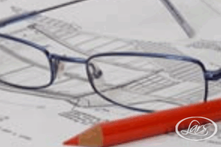 A pair of blue-rimmed glasses and a red pencil rest on top of architectural blueprints. The blueprint features detailed technical drawings and measurements. The scene suggests an environment of careful planning and design work.