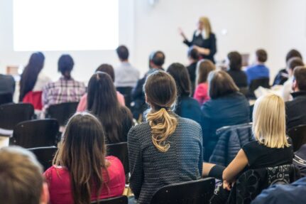Homeowners attend a remodeling workshop to learn about renovation costs, project planning, design-build services, and strategies for a successful home remodel.