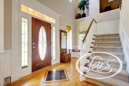 When it comes to the look and feel of your home, first impressions are just as important as they are in other aspects of life. If you can make your guests feel a warm, welcoming atmosphere as soon as they step through your front door, they’ll automatically take these positive feelings with them into the other areas of your home. In order to spark your imagination and help you create the ideal entryway that packs both style and function, we prepared a list of 7 color ideas for a sunny and inviting foyer. Keep reading to learn more! What are the best colors for an entryway? Whichever hue you choose, it goes without saying that it should fit the rest of your interior decor. If you can’t decide which color to go for or how to combine different shades, don’t hesitate to reach out to a trusted house renovation company and consult with the pros directly. Here are 7 great entryway colors you can’t go wrong with: 1. Crisp, clean white Whether you have a small or large space, pristine white hues are always a good choice. The bright surfaces reflect both natural and artificial light, creating a cheerful and open atmosphere that can be further enhanced with all kinds of ornaments. 2. Soft pink Want to add some color, but not make the space look too intense or dark? A soft pink hue can give the foyer a romantic touch that’s just subtle enough to create a welcoming transition while also adding a bit of depth. 3. Light, organic green This earthy green hue is the perfect option if you live in an area where the weather is often cool and overcast, as it gives the space some freshness and comfort. It has the added advantage of getting along really well with many other colors. 4. Neutral gray Gray has been a beloved foyer color for a long time, and it’s easy to see why. It can be combined with both darker and brighter accent colors, while also working well with other shades of gray such as slate, pewter, or lead. If you prefer a more luxurious look, you can combine darker gray hues with rich colors like emerald green and wine red. 5. Various shades of beige It’s hard to go wrong with beige. This color adds elegance and sophistication to an entryway without calling too much attention to itself or unnecessarily darkening the space. 6. Aqua blue A bright blue shade is more neutral than other blues, while also giving the space a major beach decor feeling and working really well with various other popular hues. 7. Bright orange An orange front door has a vibe that’s both welcoming and energetic. However, because it's so bold, vibrant orange hues should be used in limited amounts and balanced with large neutral areas. Where can I find the top house renovators in San Diego? Here at Lars Remodeling & Design, we’re a collaborative group of renovation experts, project managers, trade partners, and highly skilled designers who specialize in assisting the good people of San Diego at all stages of their custom home renovation projects. During our 30 years of industry presence, we have remodeled more than 3000 homes and had the distinction of being given the Best Remodeler award for years 2019 and 2020 by the San Diego Union Tribune. Whether you’re planning to extensively renovate your kitchen or just give an old bathroom a facelift, you can count on us to deliver your desired results in a way that ensures maximum longevity and avoids common remodeling pitfalls. Give us a call today!