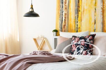 How do you style a modern bedroom