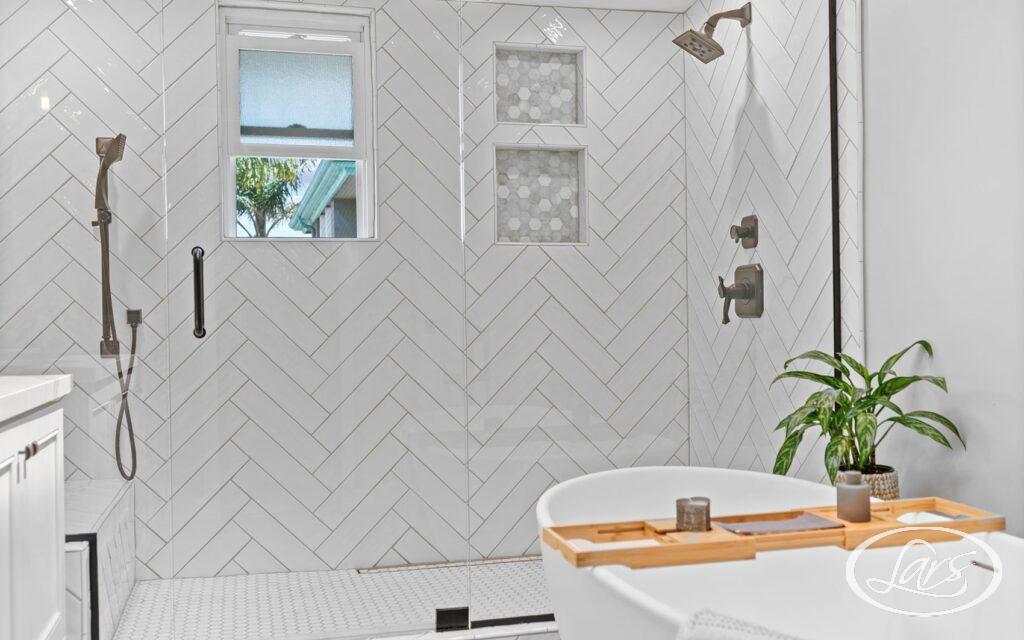 Newly remodeled bathroom in San Diego with subway tile shower walls.