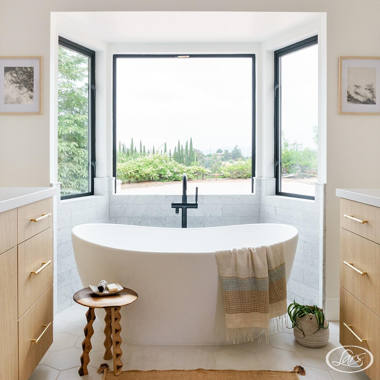 Newly remodeled bathroom in San Diego with a freestanding tub.