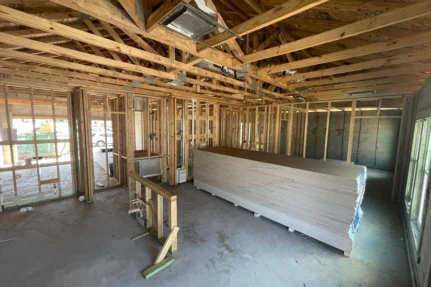 A home in the middle of a large-scale remodeling that takes it all the way to the studs.