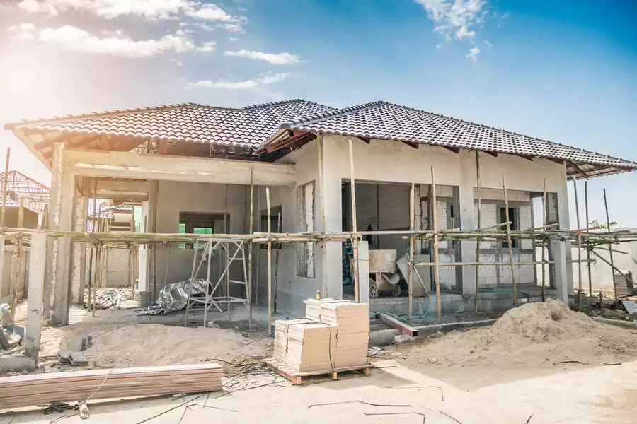 A new room being added to a Spanish-style home.