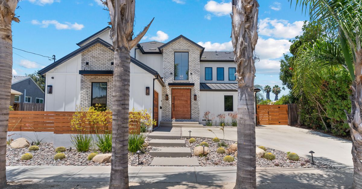 Modern two-story home exterior remodel with clean landscaping and contemporary design in San Diego