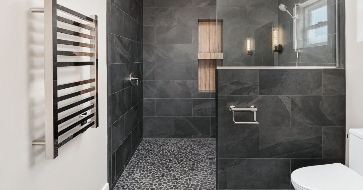 Spacious aging-in-place bathroom remodel with accessible shower, modern vanity, and exterior access door in San Diego.