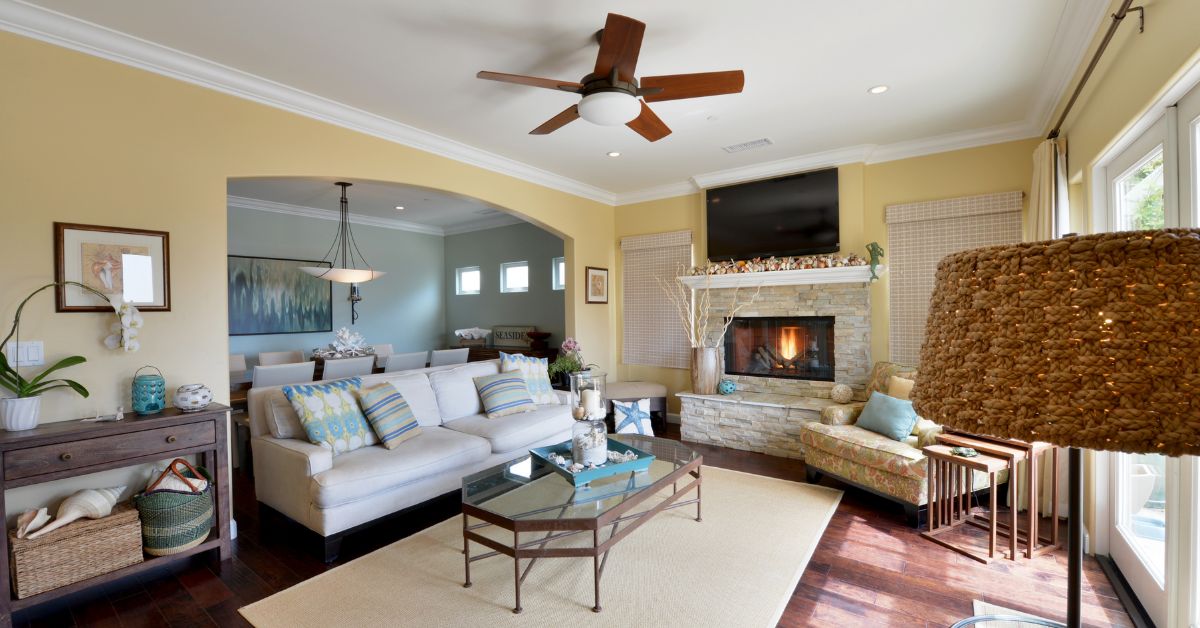 Two-story remodeled suburban home with updated exterior siding, garage doors, and entryway
