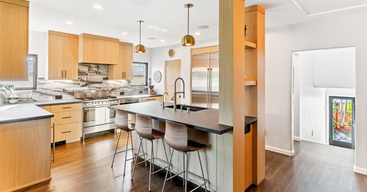 Completed modern condominium remodel featuring an open-concept living room, dining area, and upgraded finishes.