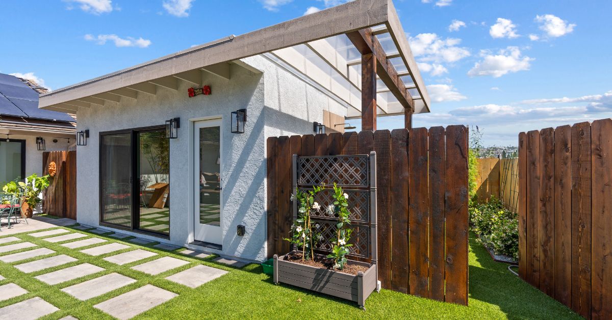 Exterior balcony addition overlooking golf course with updated railing and covered patio
