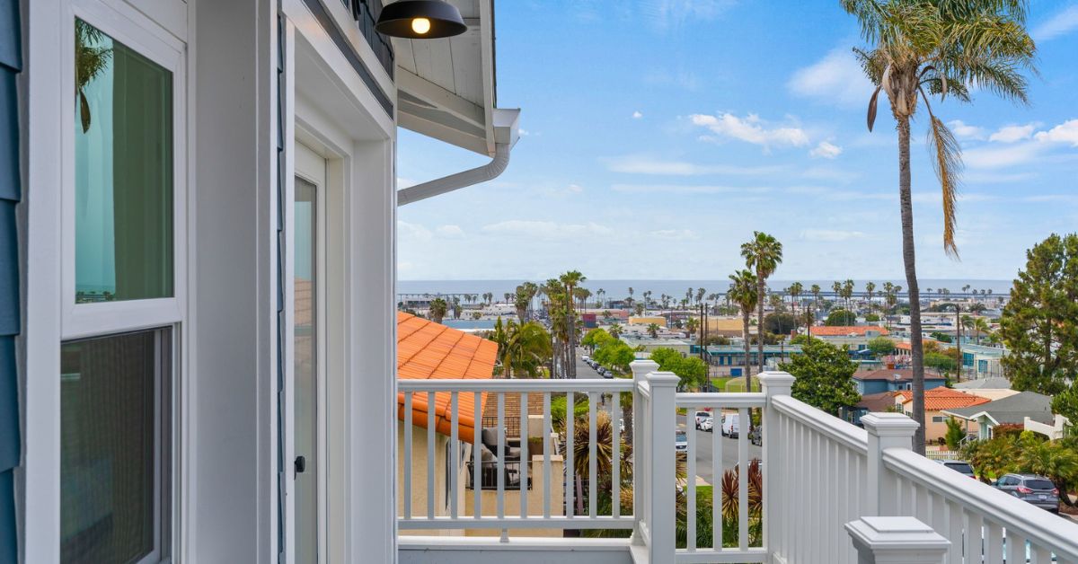 Ocean-view San Diego home overlooking a coastal neighborhood and nearby shoreline.