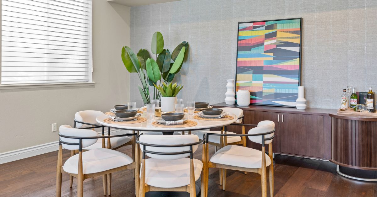 Homeowner reviewing material samples and plans on a table