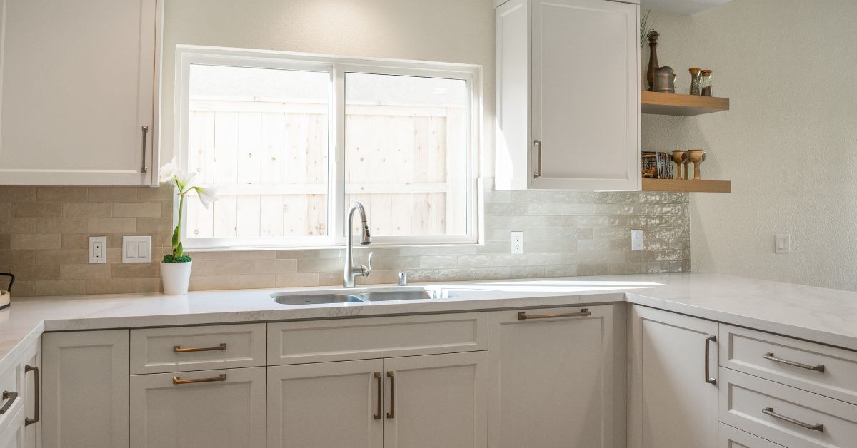 Modern luxury kitchen with custom cabinetry, oversized island, premium finishes, and high-end appliances designed for upscale living.