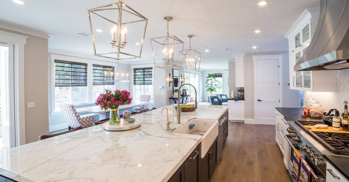 Bright open-concept kitchen remodel in San Diego with custom cabinetry, large island, and cohesive interior design