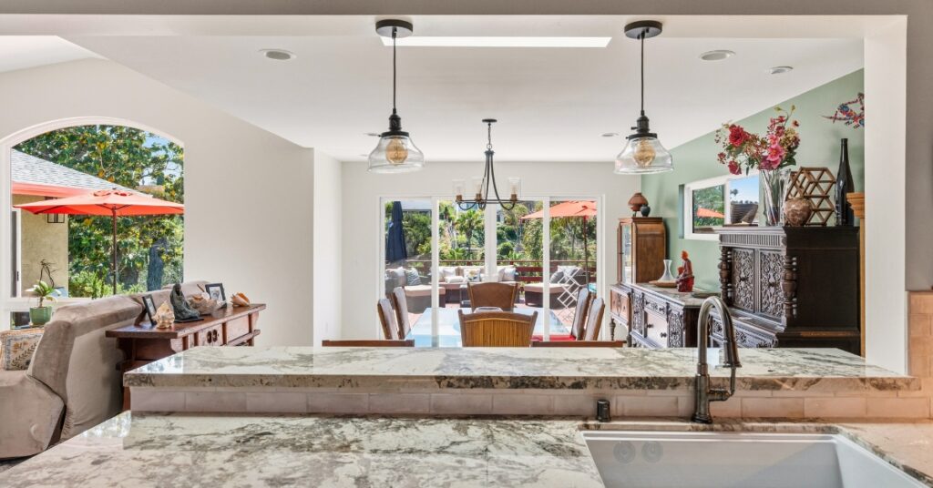 Open-concept kitchen and family room designed to encourage gathering and connection in a multi-generational household.