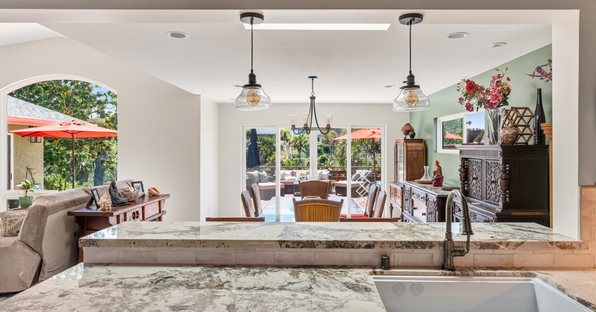 Open-concept kitchen and family room designed to encourage gathering and connection in a multi-generational household.