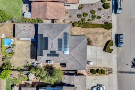 Aerial view of a custom property designed with multiple living zones and flexible space for multi-generational living.