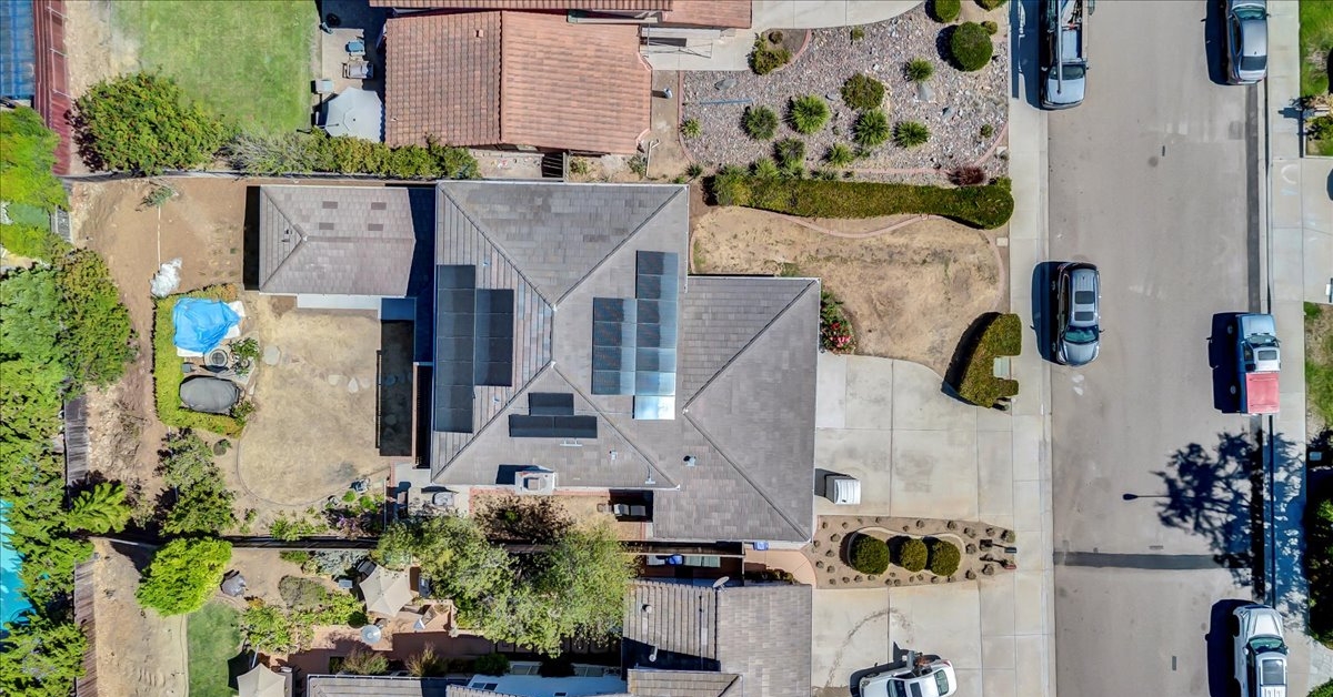 Aerial view of a custom property designed with multiple living zones and flexible space for multi-generational living.