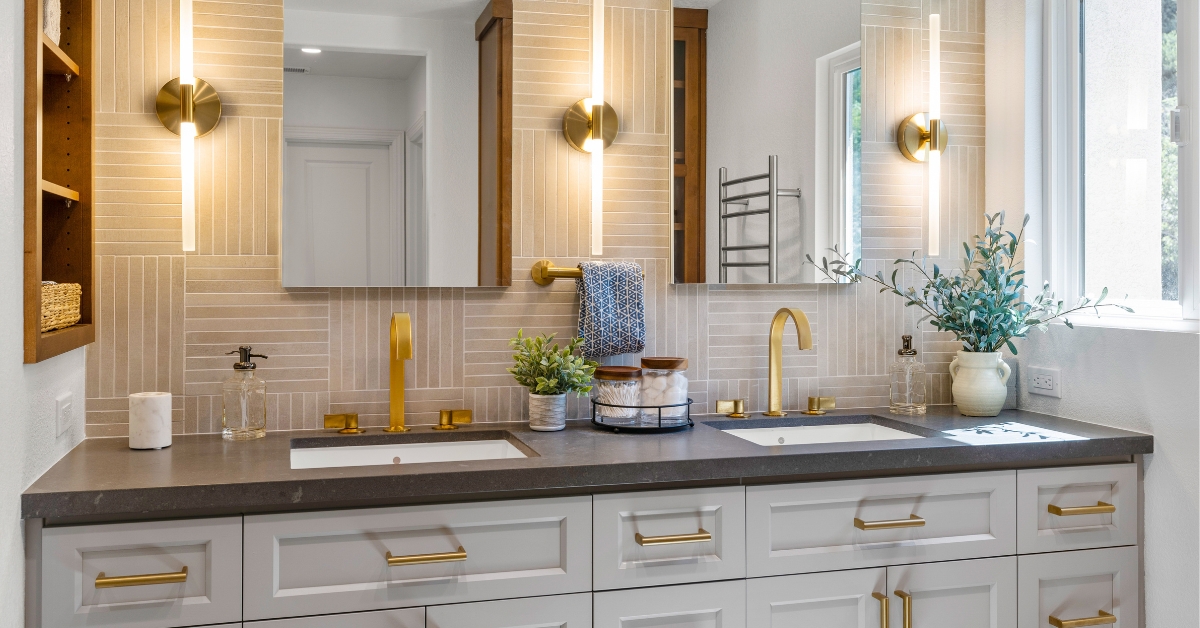Modern bathroom designed for aging-in-place and multi-generational living featuring dual vanities, accessible layout, ample storage, and high-end finishes.