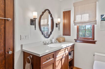 Renovated bathroom with wooden accents