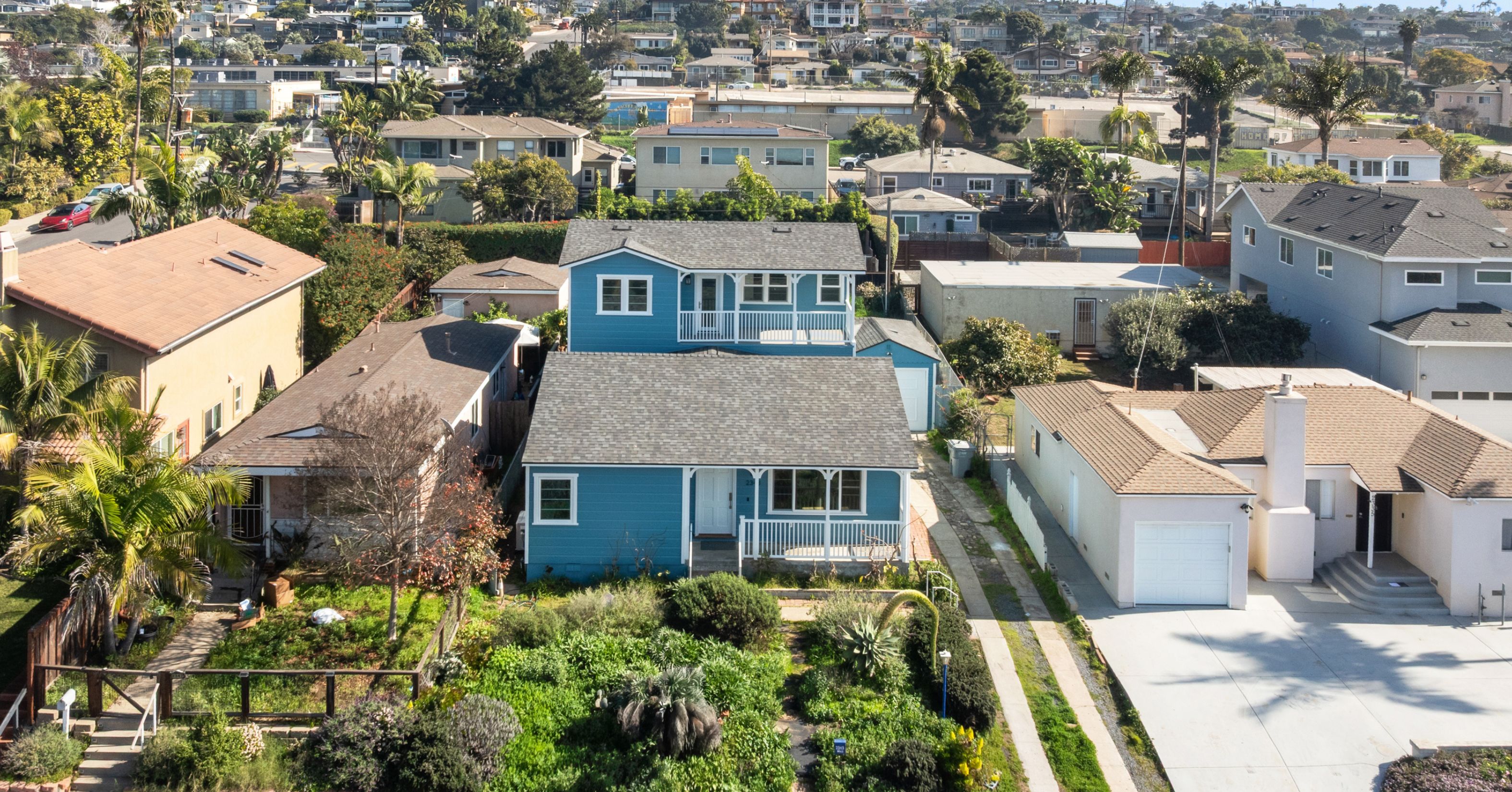 Aerial view of a residential San Diego neighborhood with single-family homes and established communities.